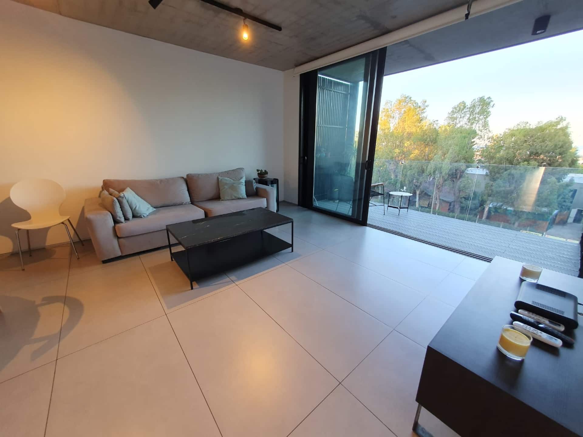 Apartamento de 1 quarto com varanda dupla e vista para o rio em Vicente López