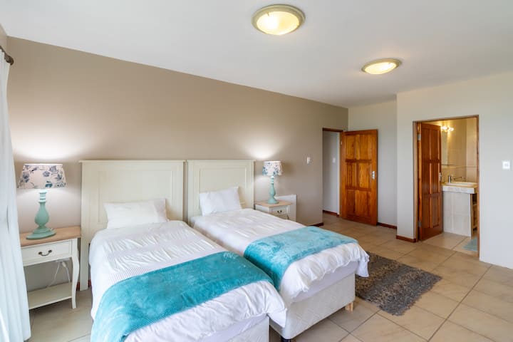 Third bedroom single beds with heated blankets and a full ensuite bathroom