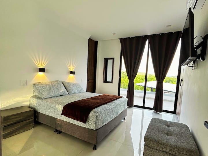 2nd floor: Room C
Primary bedroom with private bathroom and closet.

AC unit, TV included and private balcony.