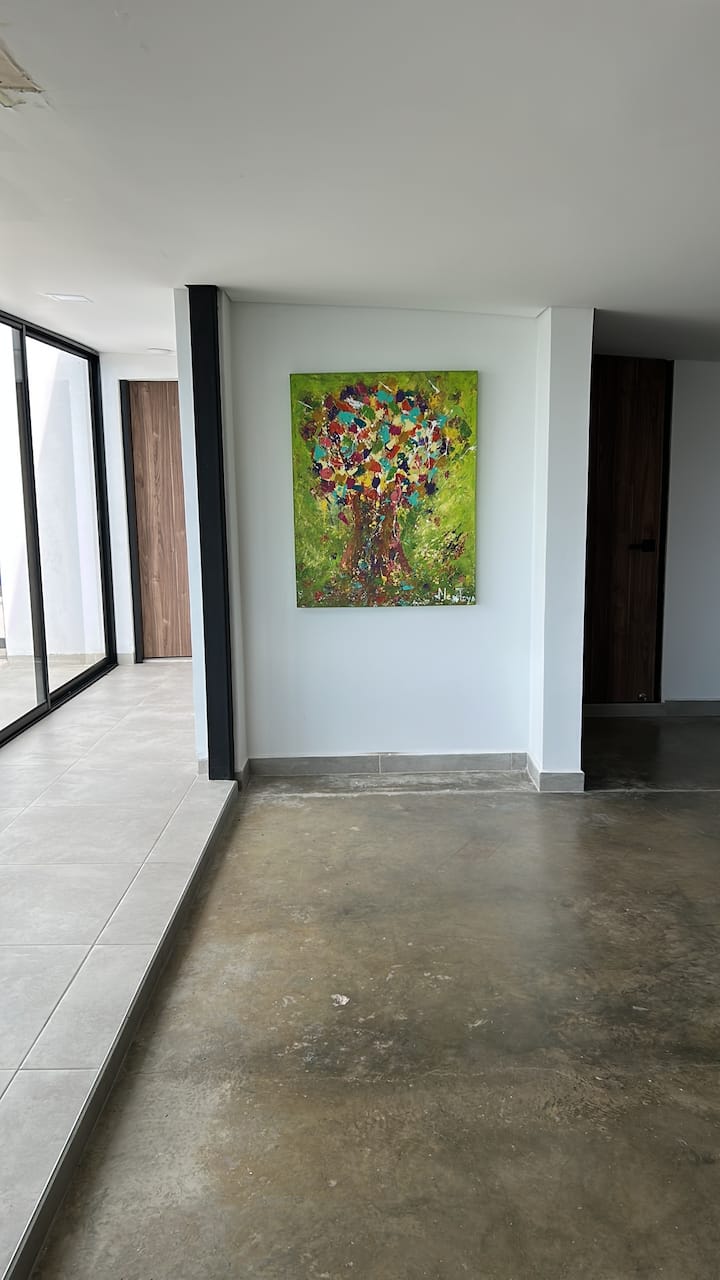 3rd floor has access to larger terrace and 1 bedroom with 2 queen beds (not pictured) and a full bathroom.