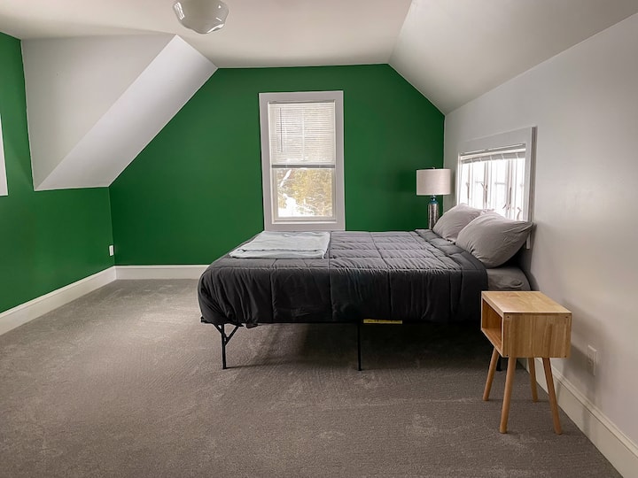 This is the King bedroom. It is the biggest room in the house and has a private master bathroom connected to it. This bedroom is upstairs.