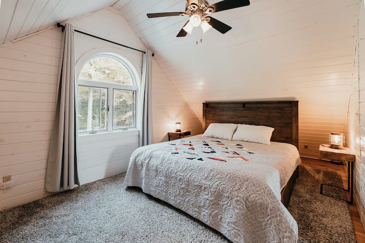 Master bedroom, one floor up. King bed. 