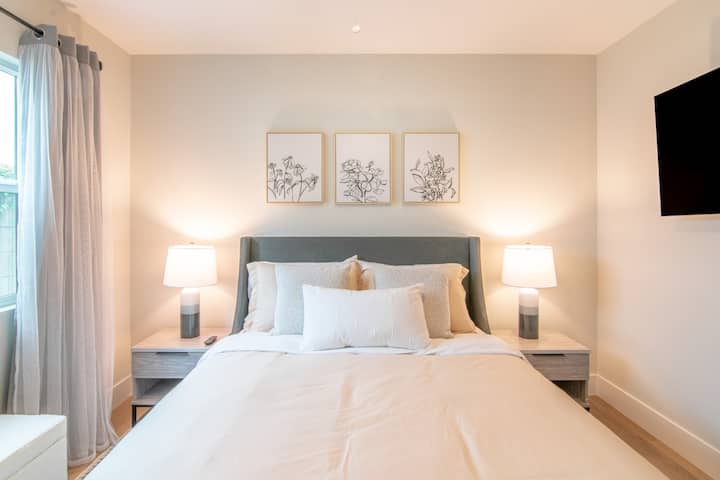 Bedroom 3 includes queen bed and smart TV.