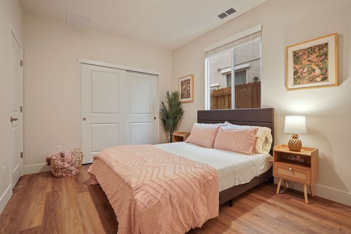 Comfortable queen bed in one of the spacious bedrooms