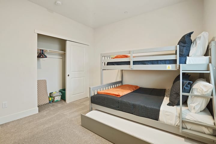 Additional view of upstairs bedroom with bunk bed and closet