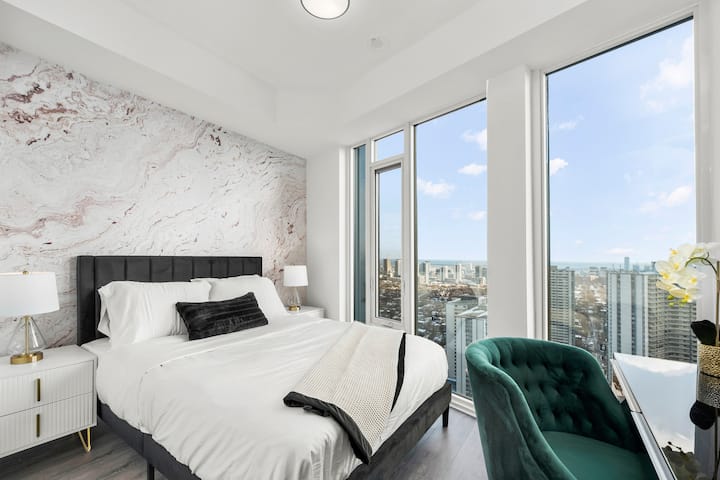 Bedroom Two | Queen Bed | Floor-to-Ceiling Windows | Stunning City & Lake Views | Work Desk