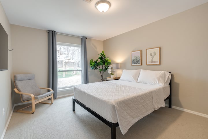 Main house guest bedroom with queen bed