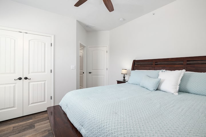 Each comfortable bedroom is outfitted with new linens and a large flatscreen TV. 