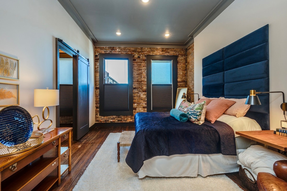 Spacious Master Suite with large bathroom and black out shades