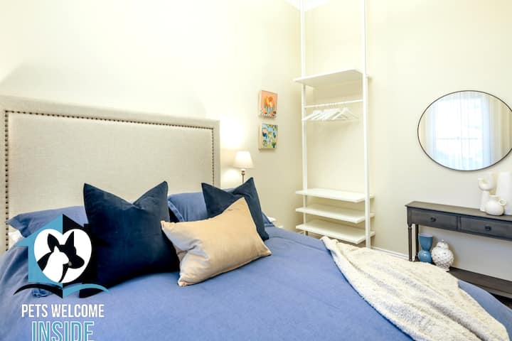 Each  bedroom has a distinct colour theme –this one is a navy blue with beds freshly made for guest arrival with sheets, pillowcases and quilt covers.