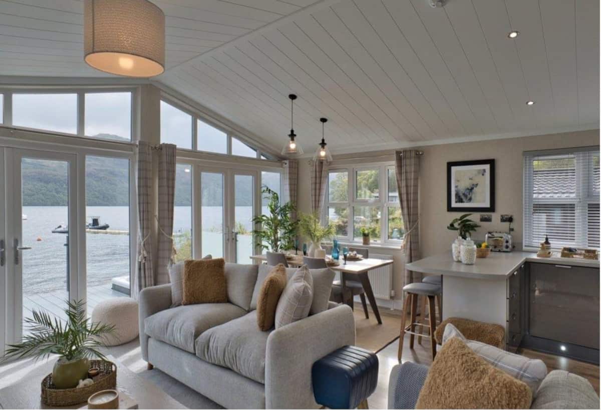 Open-plan lodge interior overlooking Loch Lomond