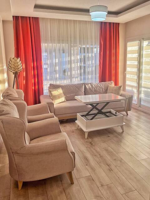 New 1+1 apartment in a new house near the sea