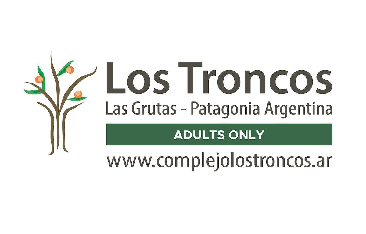 The logo for Los Troncos is displayed, featuring a stylized tree with green leaves and orange fruits. The name is presented prominently above a line stating 'Adults Only,' with the location 'Las Grutas - Patagonia Argentina' and the website link below.