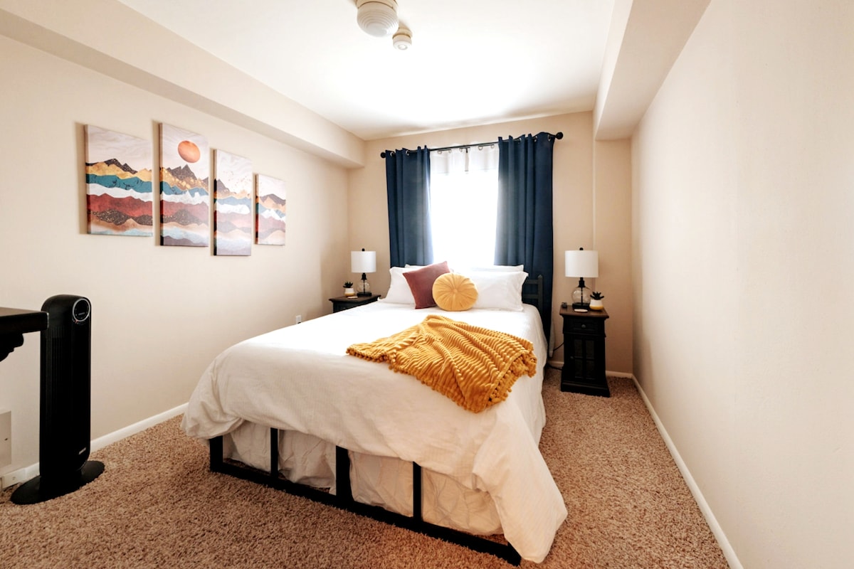 Luxury linens, cozy bed & nightstands with outlets and USB.