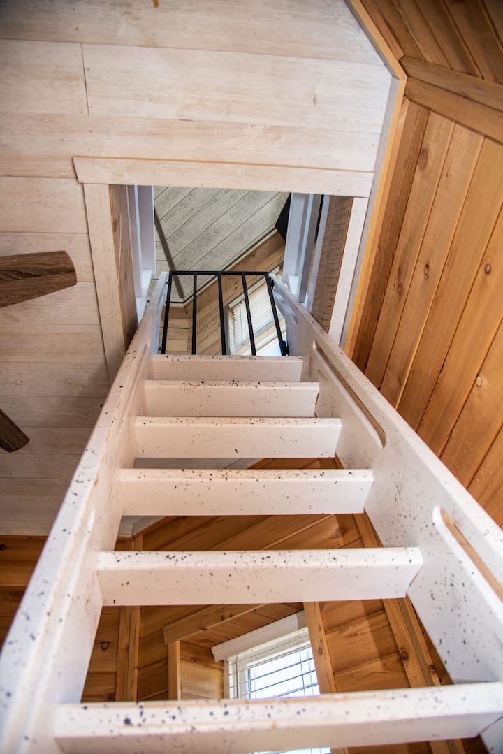 Ladder to 3rd floor (Master Suite). Gate and hatch for safety and privacy. 