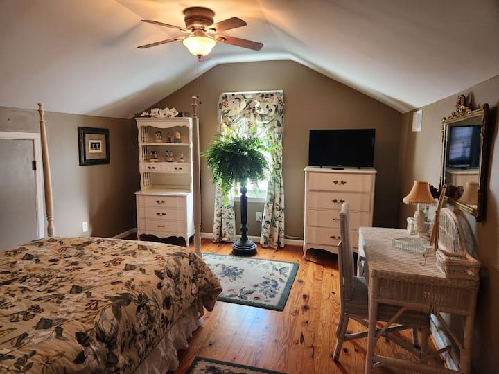 Upstairs loft bed 2.   Each bedroom has a roku tv, multiple phone chargers, and a personal fan. 
