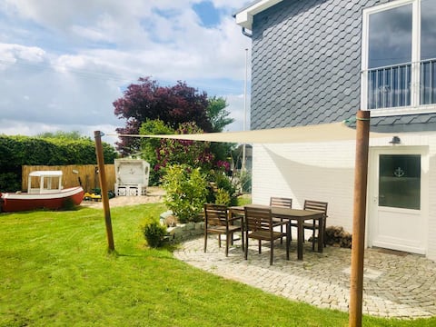 Boathouse with lake view and fireplace