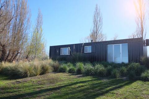 Container on the banks of the River