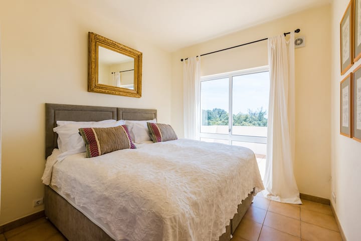 First floor queen sized bedroom with access to first floor veranda