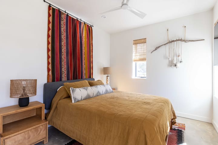 Third bedroom is located on the downstairs level with built-in storage. 