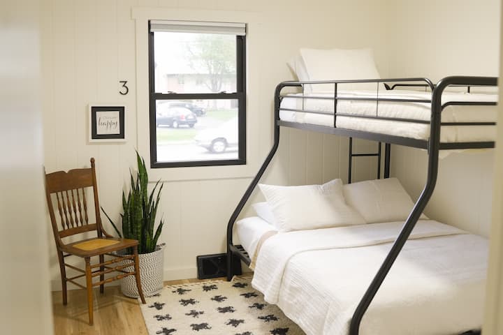 Bedroom 3 is complete with a bunk bed (twin over full), blackout shades, and closet with additional storage cubbies, games, and toys.  This room would be great for the littles during your stay.