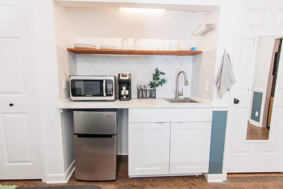 Kitchenette with microwave, coffee maker and mini fridge