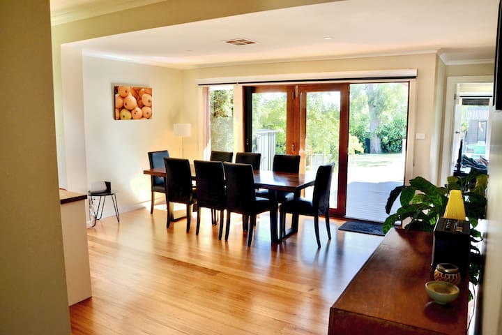‘Orange House’. Leafy backyard with pool