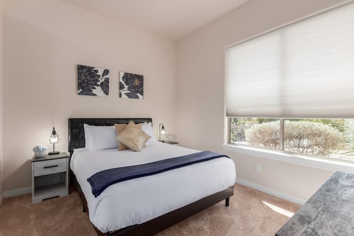 Bedroom 4- Queen memory foam mattress with premium linens and 32inch smart HDTV. Closet and dresser for storage space. 