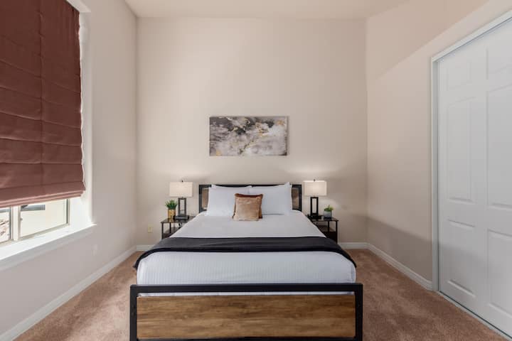 Bedroom 3- Queen memory foam mattress with premium linens and 32inch smart HDTV. Closet and dresser for storage space. 