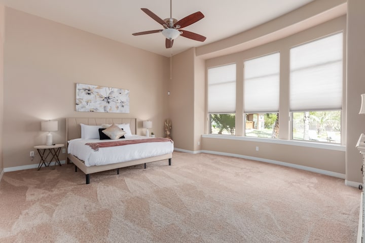 Bedroom 1- King size memory foam bed with Premium Linens and a smart 65in HDTV. Walk-in closet and dresser for storage space. 