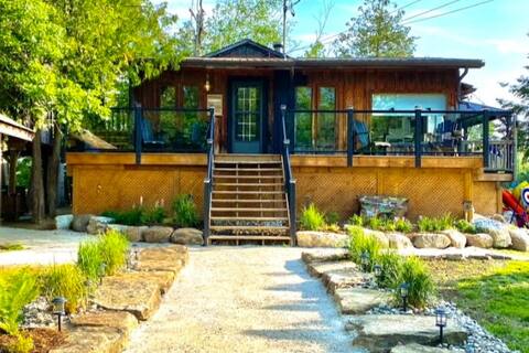 Waterfront with Treehouse and Hot Tub