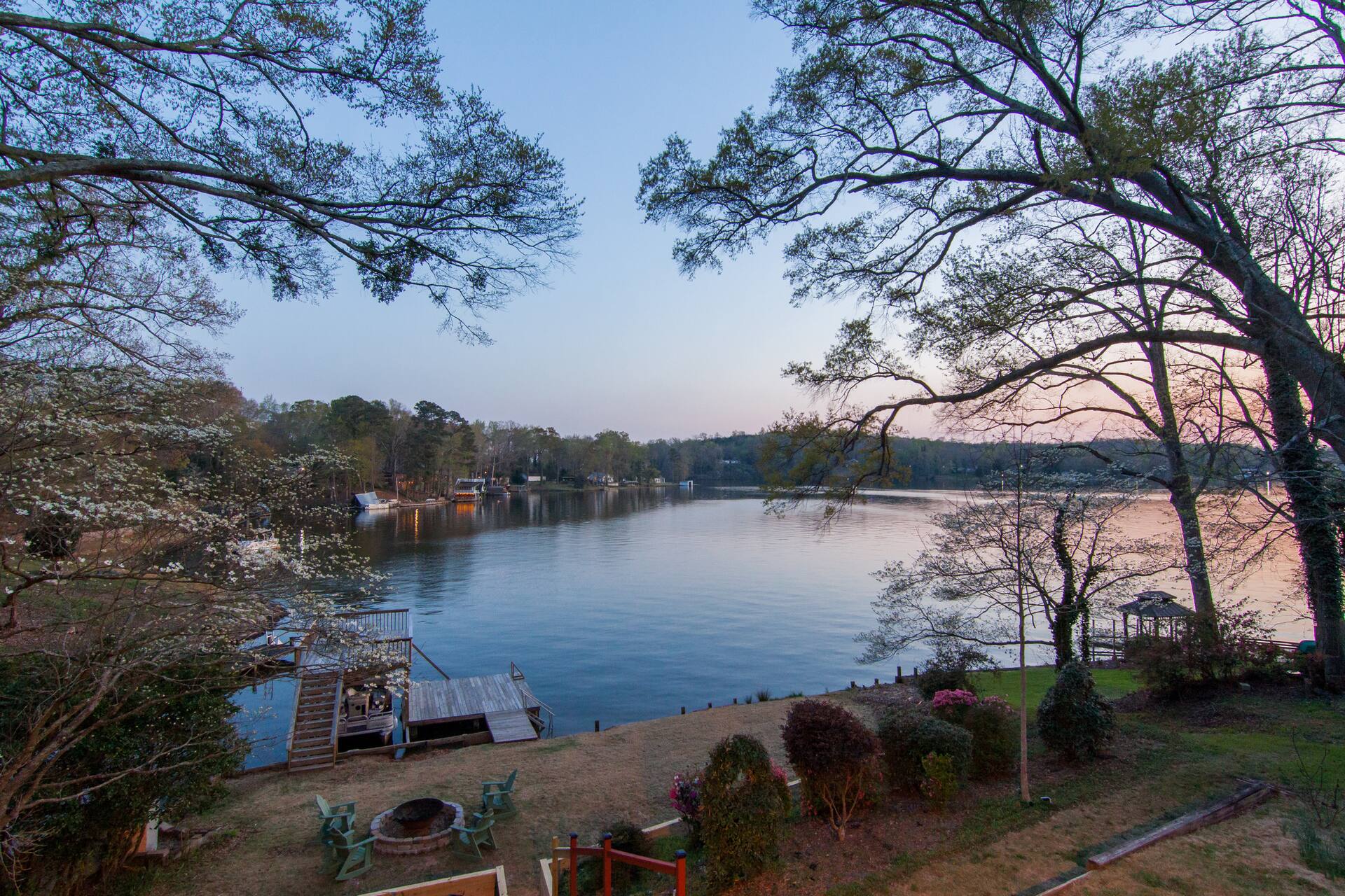 Shoreline and dock seen from the tiered backyard