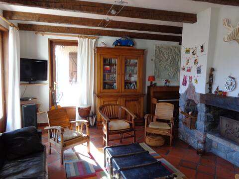 Cottage, surrounded by an enclosed garden.