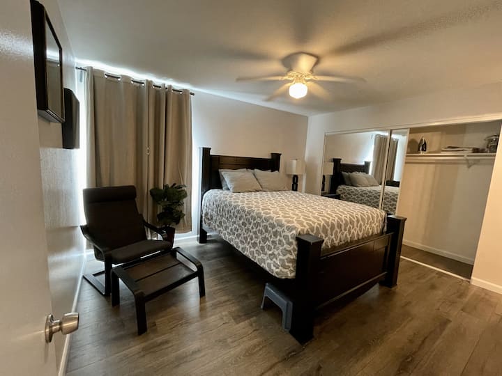 Queen bed in master with mirrored wardrobe with plenty of closet space!