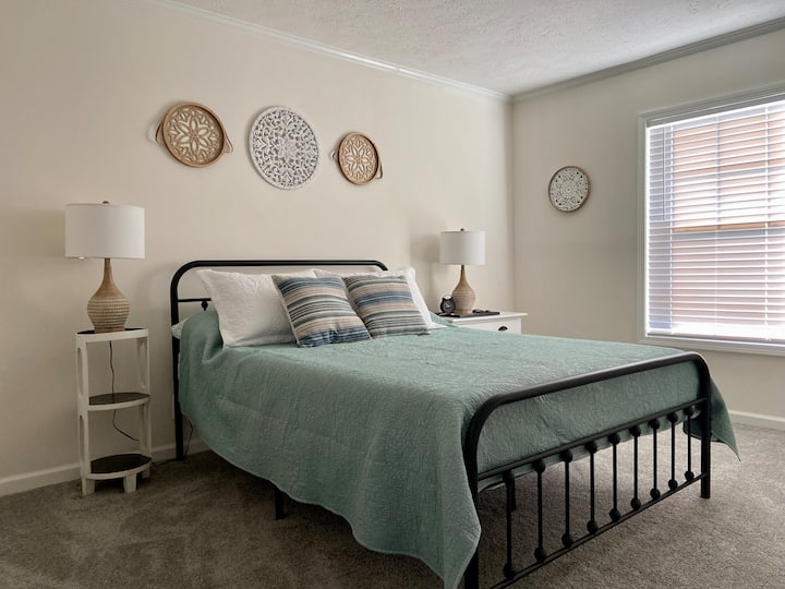 Front bedroom with a queen sized bed 