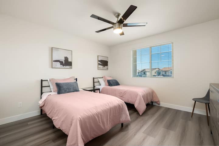 Bedroom #7: Two single beds with a smart LED TV. Has an amazing view towards the backyard.