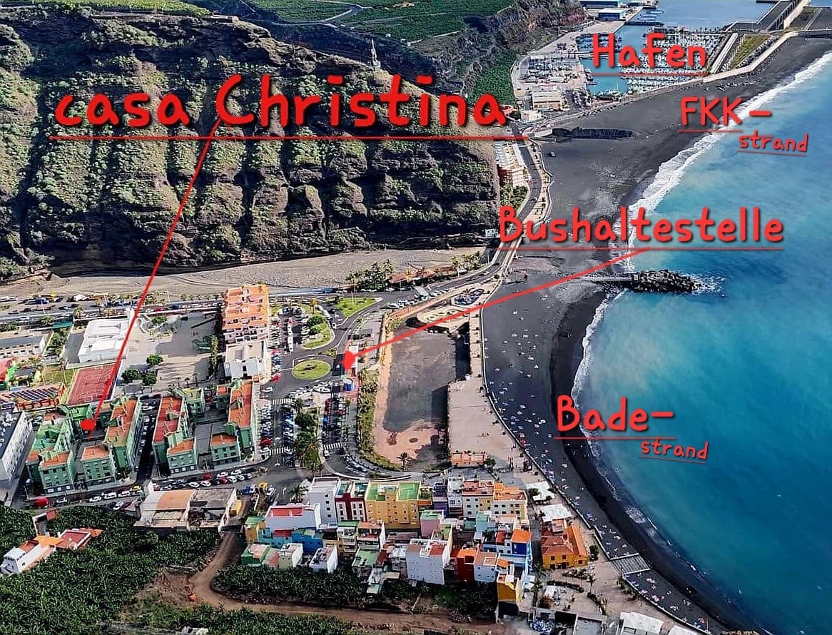 An aerial view displays the proximity of Casa Christina to key locations, including the harbor, public transport stop, and various beach areas. The beach is seen in dark sand, with residential buildings and natural landscapes framing the scene. Clear pathways connect these highlights.
