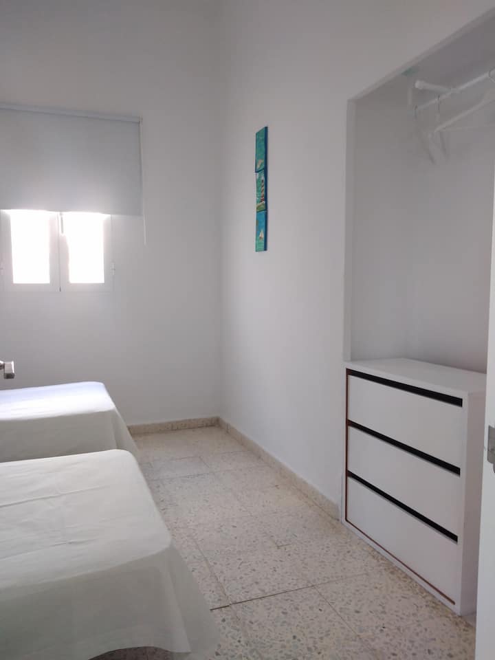 Chambre avec deux lits simples