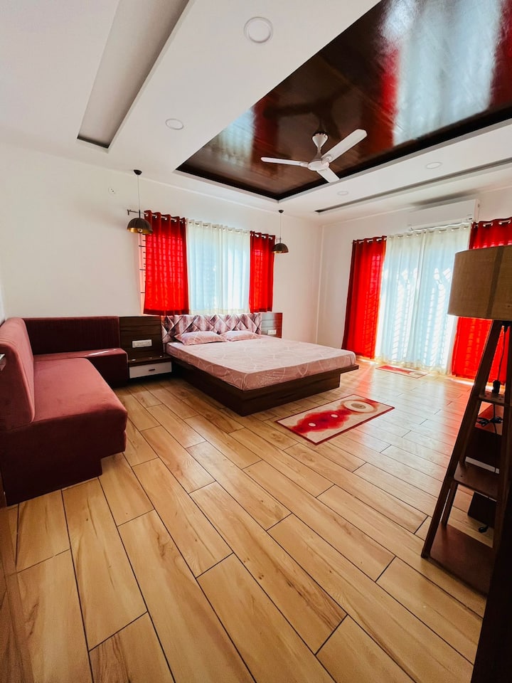 Master Bedroom with AC & King size Bed with Sofa and attached walk-in Closet & Washroom
