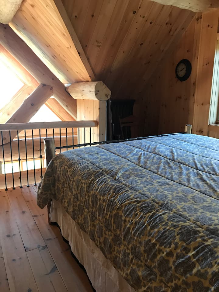 Second floor bedroom with large king size bed