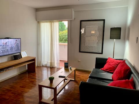 Top Airbnb: Balconies facing Plaza Chile · Tree-lined view in Departamento Capital
