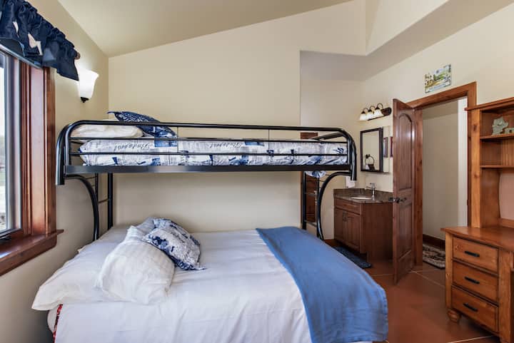 Please note that the bottom bunk is a futon mattresses rather than a traditional mattress.