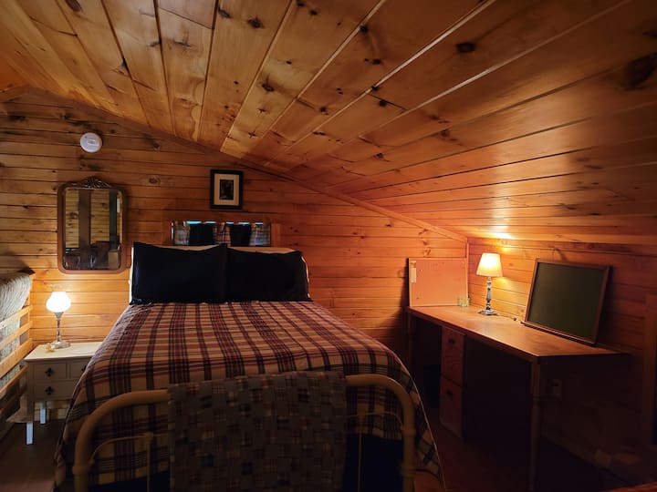 Secondary sleeping area, full-size bed in the loft