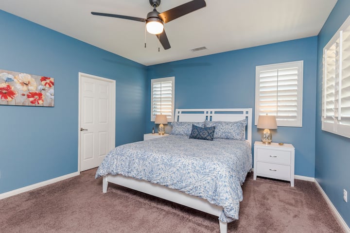 Primary bedroom has California King bed & walk-in closet which fits pack-n-play (closet is not pictured, but is located behind this closed door).