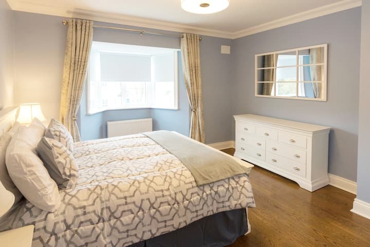 The Blue room with double bed and lots of storage space for hanging and folding clothes etc 