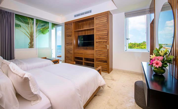 Suite con camera da letto con giardino e letti matrimoniali