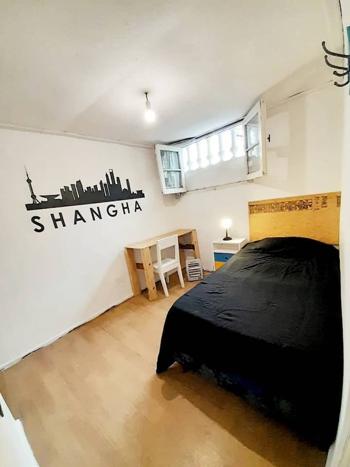 Quarto privativo em casa compartilhada em Palermo