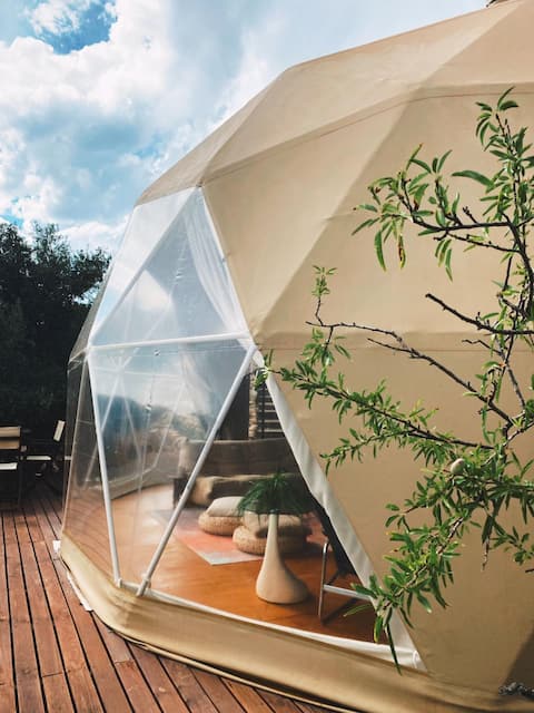 Glamping geodesic dome with hot tub in eco retreat