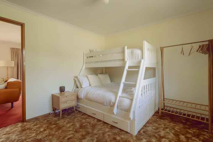 Second bedroom: double bed on bottom bunk and single top bunk. Brand new hotel grade pillows, bedding and mattresses