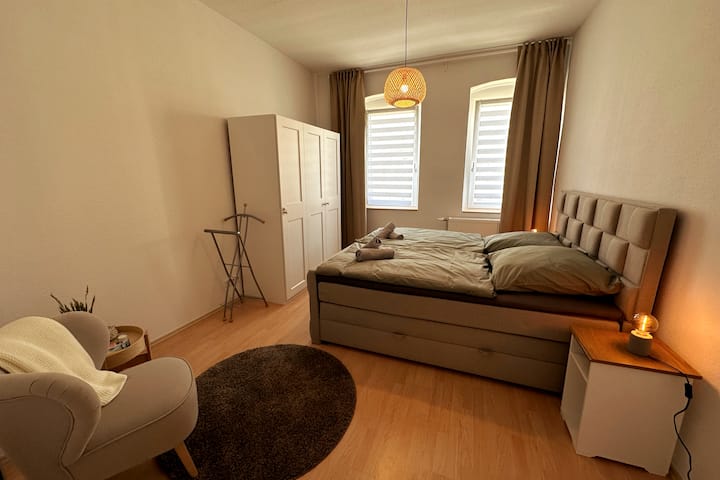 Bedroom 2 with big closet, bed and seating